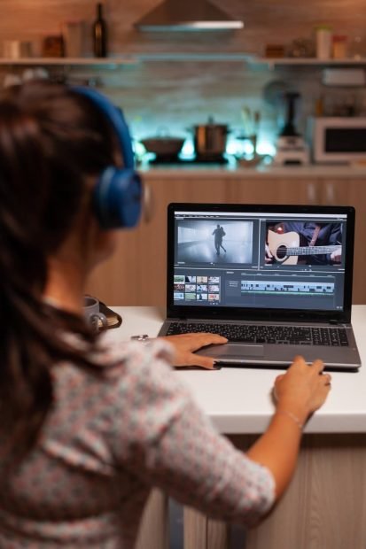 Filmmaker editing video marketing footage